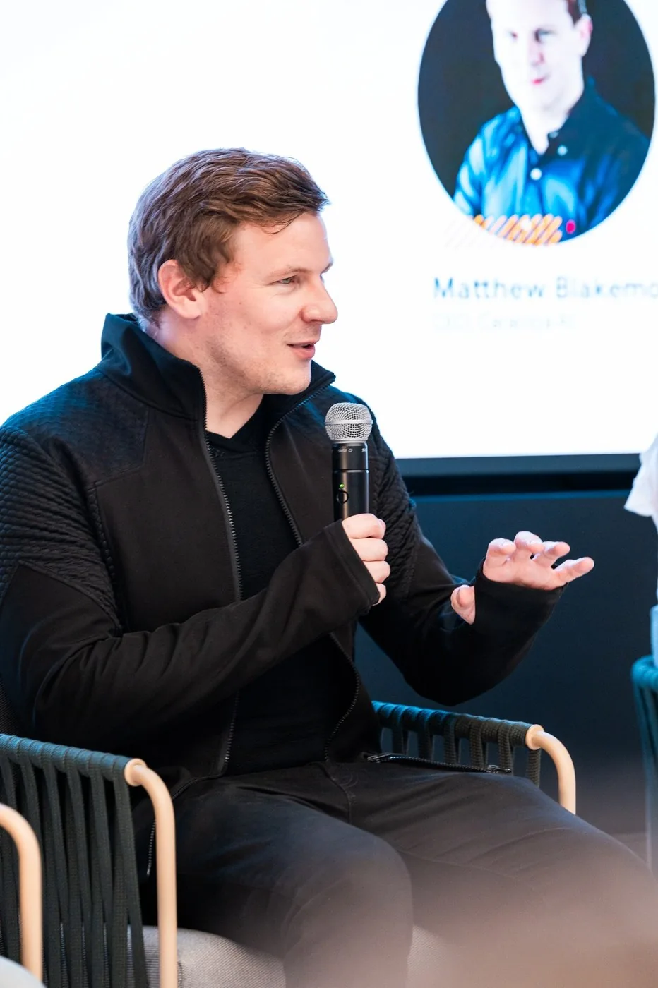 Matthew Blakemore speaking on a panel about AI agents