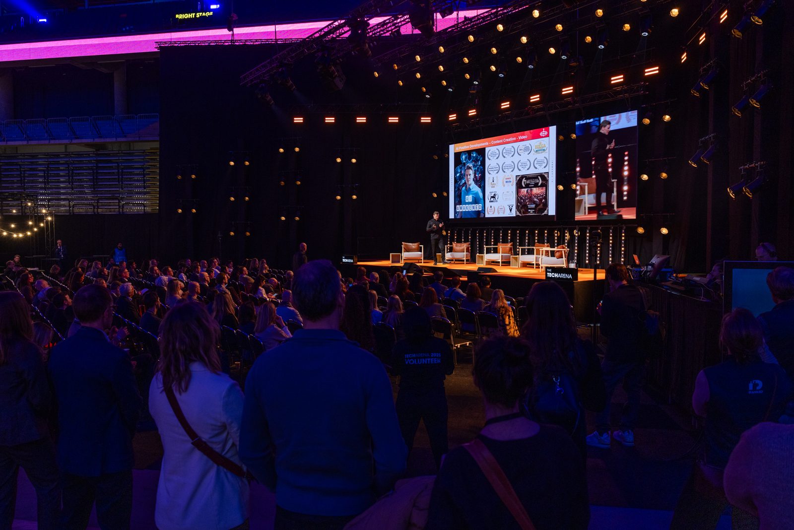 Matthew Blakemore on stage at The TechArena before a full auditorium